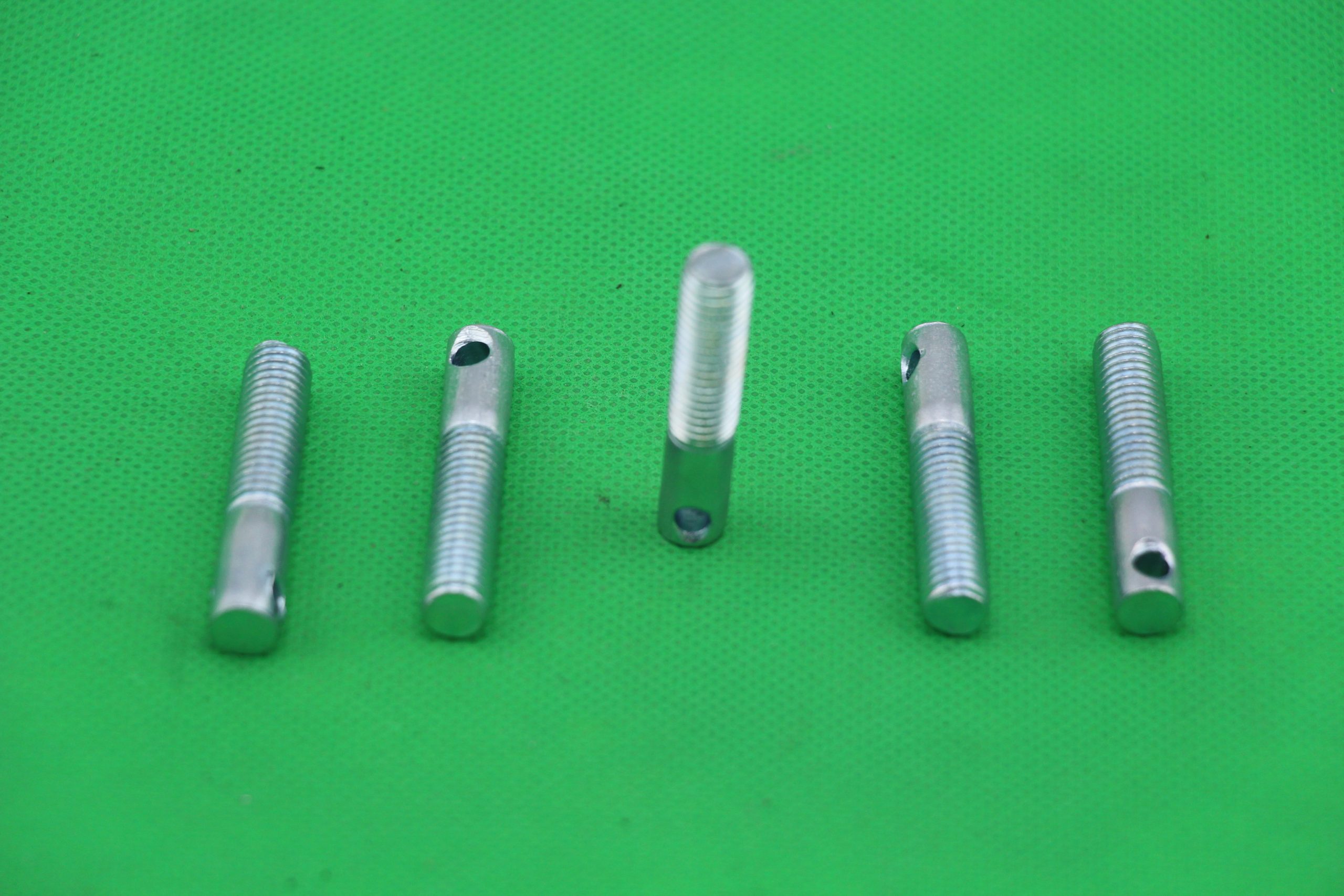 Stud machine screw with drilling hole